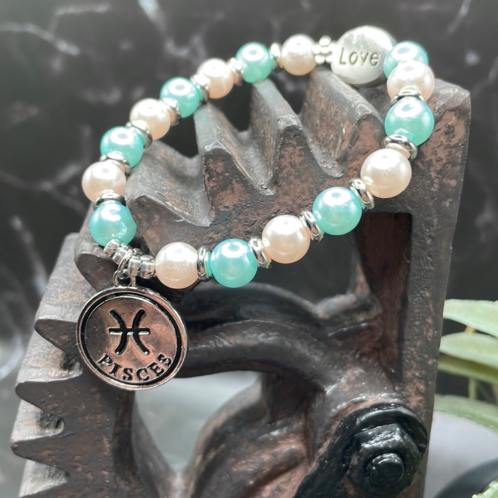 Handmade stretch bracelet with glass beads, love charm, and Pisces charm #5